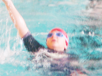 Aaron Zweig - 2006, swimming on the Dolphins swim team.